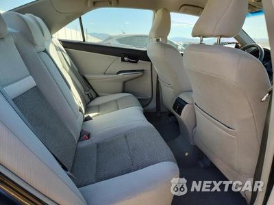 Zdjęcie 10 z 12 samochodu: 2012 TOYOTA CAMRY HYBRID XLE VIN:4T1BD1FK0CU063104 - miniatura