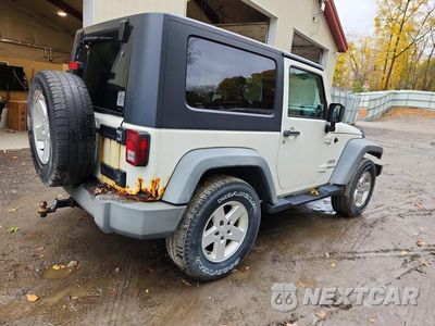 Trzecie zdjęcie samochodu z tyłu: 2010 JEEP WRANGLER SPORT VIN:1J4AA2D15AL116661 - miniatura