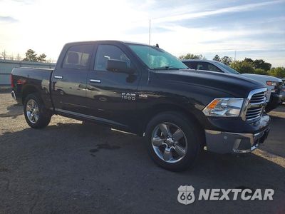 Czwarte zdjęcie samochodu z boku: 2017 RAM 1500 SLT VIN:3C6RR7LT0HG794198 - miniatura