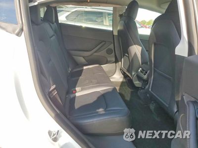 Zdjęcie 10 z 13 samochodu: 2022 TESLA MODEL Y VIN:7SAYGDEF1NF329515 - miniatura