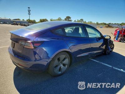 Trzecie zdjęcie samochodu z tyłu: 2021 TESLA MODEL 3 VIN:5YJ3E1EB4MF869173 - miniatura