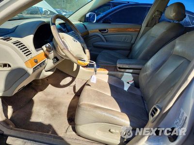 Zdjęcie 7 z 12 samochodu: 2002 INFINITI Q45 BASE VIN:JNKBF01A42M006814 - miniatura