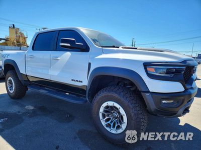 Czwarte zdjęcie samochodu z boku: 2021 RAM 1500 TRX VIN:1C6SRFU98MN830140 - miniatura