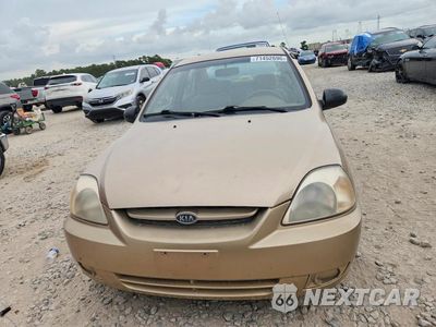 Piąte zdjęcie samochodu w środku: 2004 KIA RIO BASE VIN:KNADC125746307818 - miniatura