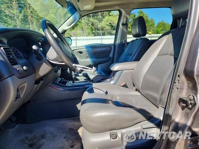Zdjęcie 7 z 13 samochodu: 2005 MAZDA TRIBUTE S VIN:4F2CZ96115KM16772 - miniatura