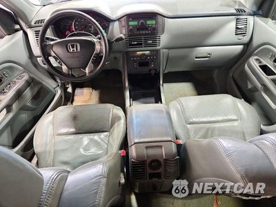 Zdjęcie 8 z 13 samochodu: 2004 HONDA PILOT EXL VIN:5FNYF18574B010247 - miniatura