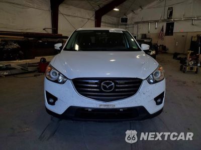 Piąte zdjęcie samochodu w środku: 2016 MAZDA CX-5 TOURING VIN:JM3KE4CY9G0905955 - miniatura