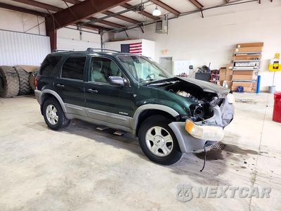 Czwarte zdjęcie samochodu z boku: 2001 FORD ESCAPE XLT VIN:1FMYU03111KF43404 - miniatura
