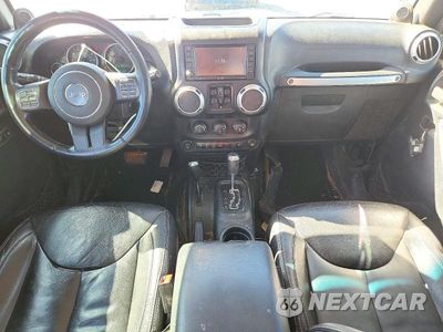 Zdjęcie 8 z 14 samochodu: 2014 JEEP WRANGLER UNLIMITED SAHARA VIN:1C4BJWEG4EL247719 - miniatura
