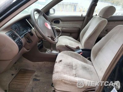 Zdjęcie 7 z 12 samochodu: 1996 TOYOTA COROLLA DX VIN:1NXBB02E8TZ405723 - miniatura