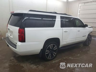 Trzecie zdjęcie samochodu z tyłu: 2018 CHEVROLET SUBURBAN K1500 PREMIER VIN:1GNSKJKC1JR303776 - miniatura
