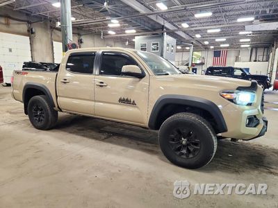 Czwarte zdjęcie samochodu z boku: 2020 TOYOTA TACOMA SR V6 VIN:5TFCZ5AN1LX221239 - miniatura
