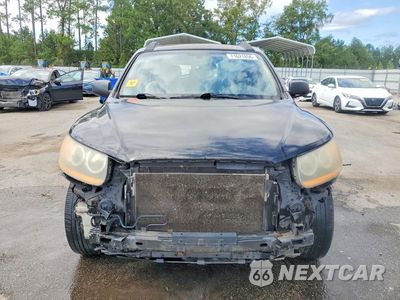 Piąte zdjęcie samochodu w środku: 2010 HYUNDAI SANTA FE GLS VIN:5NMSG3AB2AH402240 - miniatura