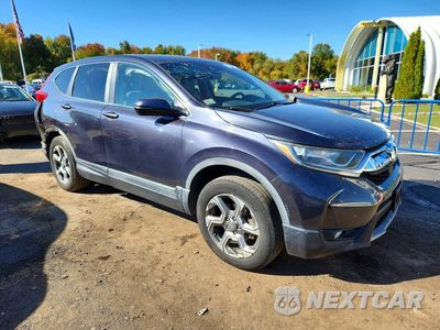 Czwarte zdjęcie samochodu z boku: 2017 HONDA CR-V EXL VIN:5J6RW2H81HL021665 - miniatura