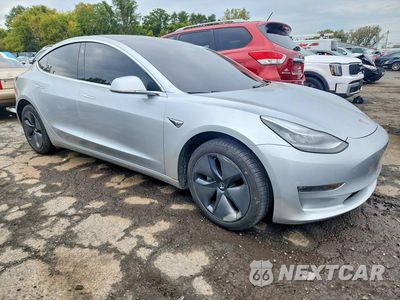 Czwarte zdjęcie samochodu z boku: 2018 TESLA MODEL 3 VIN:5YJ3E1EB0JF065075 - miniatura
