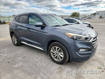 Czwarte zdjęcie samochodu z boku: 2017 HYUNDAI TUCSON SE VIN:KM8J33A43HU485653 - miniatura