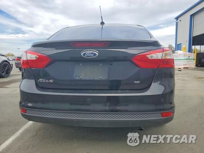 Zdjęcie 6 z 13 samochodu: 2014 FORD FOCUS SE VIN:1FADP3F21EL118416 - miniatura