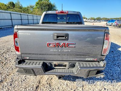 Zdjęcie 6 z 13 samochodu: 2022 GMC CANYON AT4 VIN:1GTG6FEN6N1176198 - miniatura