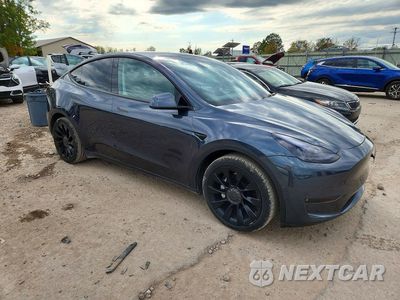 Czwarte zdjęcie samochodu z boku: 2022 TESLA MODEL Y VIN:7SAYGAEE3NF519466 - miniatura