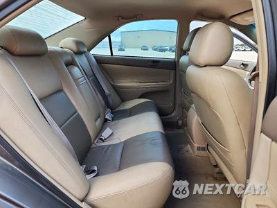 Zdjęcie 10 z 12 samochodu: 2003 TOYOTA CAMRY LE VIN:4T1BE32K13U671311 - miniatura