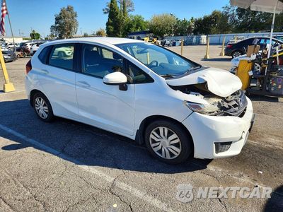 Czwarte zdjęcie samochodu z boku: 2016 HONDA FIT LX VIN:JHMGK5H51GX011420 - miniatura