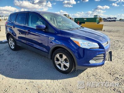 Czwarte zdjęcie samochodu z boku: 2014 FORD ESCAPE SE VIN:1FMCU9G93EUB48570 - miniatura