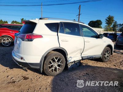 Trzecie zdjęcie samochodu z tyłu: 2018 TOYOTA RAV4 HV SE VIN:JTMJJREV6JD224622 - miniatura