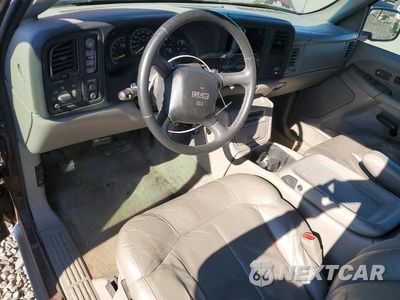 Zdjęcie 8 z 12 samochodu: 2000 GMC NEW SIERRA K1500 VIN:1GTEK19T6YE131368 - miniatura
