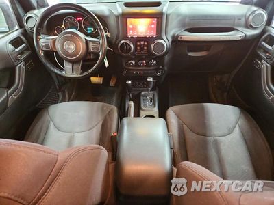 Zdjęcie 8 z 12 samochodu: 2014 JEEP WRANGLER UNLIMITED SPORT VIN:1C4BJWDG1EL158563 - miniatura