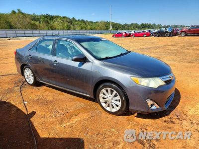 Czwarte zdjęcie samochodu z boku: 2012 TOYOTA CAMRY HYBRID XLE VIN:4T1BD1FK1CU003266 - miniatura