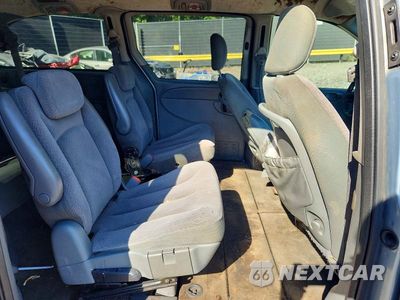 Zdjęcie 11 z 13 samochodu: 2006 DODGE GRAND CARAVAN SXT VIN:2D4GP44L36R854830 - miniatura