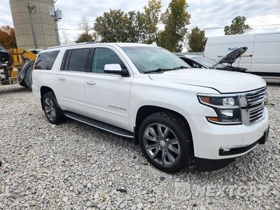 Czwarte zdjęcie samochodu z boku: 2018 CHEVROLET SUBURBAN K1500 PREMIER VIN:1GNSKJKC8JR254043 - miniatura