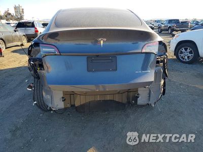 Zdjęcie 6 z 14 samochodu: 2023 TESLA MODEL Y VIN:7SAYGDEE1PA116684 - miniatura