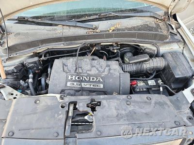 Zdjęcie 12 z 13 samochodu: 2006 HONDA PILOT EX VIN:2HKYF18606H556742 - miniatura