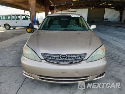 Piąte zdjęcie samochodu w środku: 2002 TOYOTA CAMRY LE VIN:JTDBE32K020010296 - miniatura