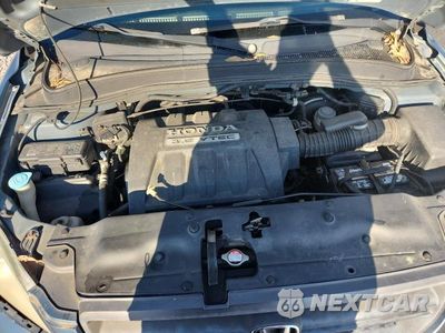 Zdjęcie 12 z 13 samochodu: 2005 HONDA PILOT EXL VIN:5FNYF18665B014395 - miniatura