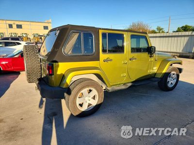 Trzecie zdjęcie samochodu z tyłu: 2007 JEEP WRANGLER SAHARA VIN:1J4GB59177L199231 - miniatura