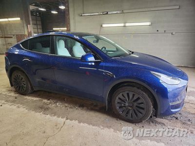 Czwarte zdjęcie samochodu z boku: 2024 TESLA MODEL Y VIN:7SAYGDEE2RA215372 - miniatura