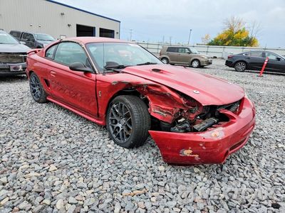 Czwarte zdjęcie samochodu z boku: 1998 FORD MUSTANG COBRA VIN:1FAFP47V5WF191330 - miniatura