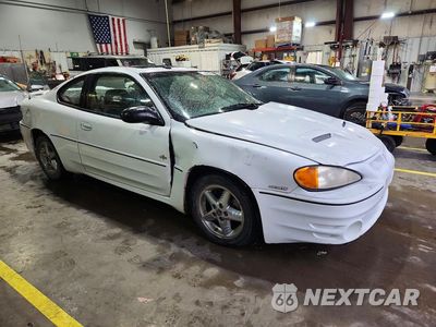 Czwarte zdjęcie samochodu z boku: 2003 PONTIAC GRAND AM GT1 VIN:1G2NV12E03C320156 - miniatura