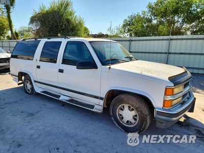 Czwarte zdjęcie samochodu z boku: 2001 CHEVROLET SUBURBAN C1500 VIN:1GNEC16R1TJ332219 - miniatura