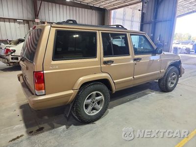 Trzecie zdjęcie samochodu z tyłu: 1999 JEEP CHEROKEE SPORT VIN:1J4FF68S2XL529244 - miniatura