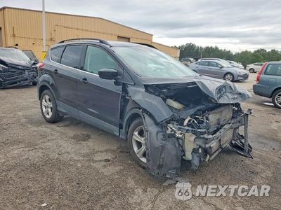 Czwarte zdjęcie samochodu z boku: 2014 FORD ESCAPE VIN:1FMCU0GX0EUC97755 - miniatura