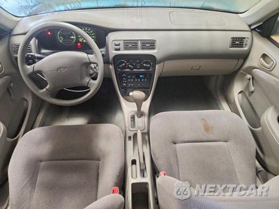 Zdjęcie 8 z 12 samochodu: 2001 CHEVROLET GEO PRIZM BASE VIN:1Y1SK52821Z412433 - miniatura