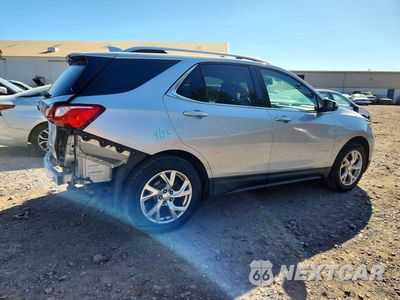 Trzecie zdjęcie samochodu z tyłu: 2018 CHEVROLET EQUINOX PREMIER VIN:2GNAXMEV4J6311622 - miniatura
