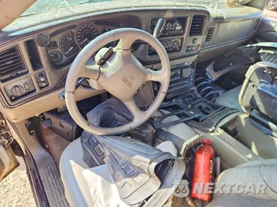 Zdjęcie 8 z 14 samochodu: 2002 GMC DENALI XL K1500 VIN:1GKFK66U92J258441 - miniatura