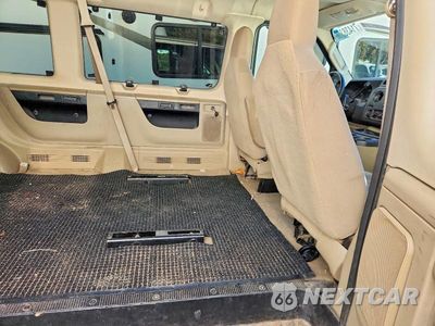 Zdjęcie 10 z 12 samochodu: 2010 FORD ECONOLINE E350 SUPER DUTY WAGON VIN:1FBNE3BL5ADA58037 - miniatura