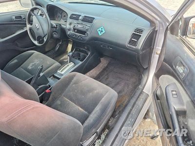 Zdjęcie 8 z 12 samochodu: 2004 HONDA CIVIC LX VIN:1HGEM22554L071330 - miniatura