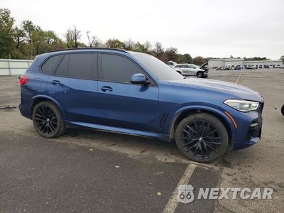 Czwarte zdjęcie samochodu z boku: 2022 BMW X5 M50I VIN:5UXJU4C00N9J35380 - miniatura