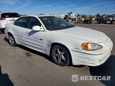 Czwarte zdjęcie samochodu z boku: 2001 PONTIAC GRAND AM VIN:1G2NW52E71C200968 - miniatura